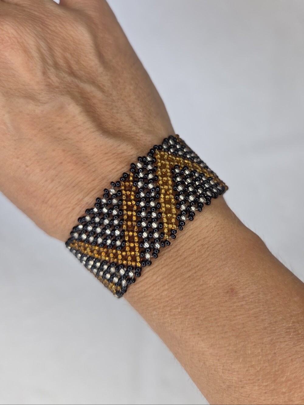 Handmade Seed Beaded Bracelet in Gold, Black & Silver